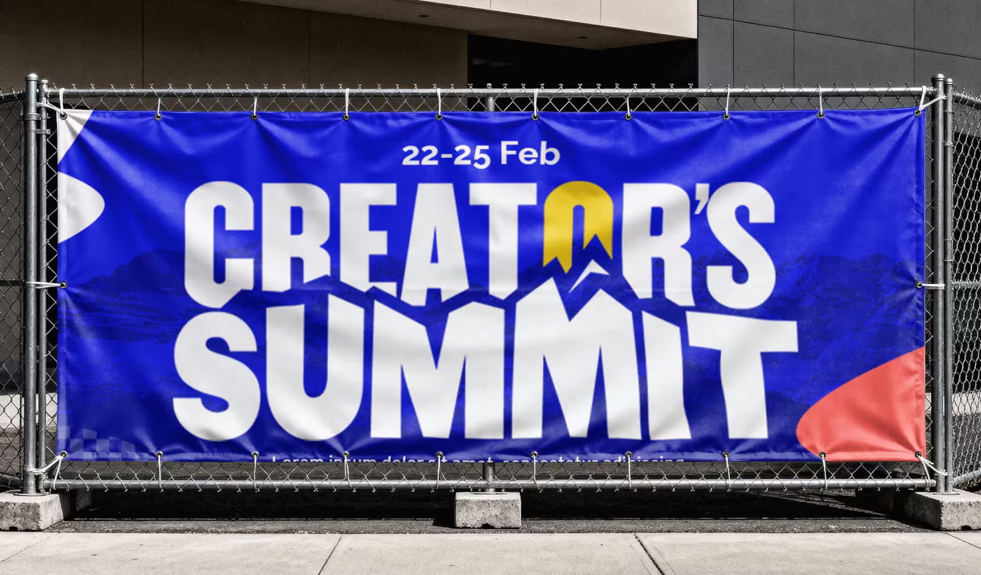 Large outdoor banner with the Creator's Summit logo on event fencing